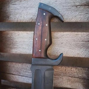 Handmade Sword
Hand Forged Sword
Handmade Machete
Hand Forged Machete
Sword
Damascus Steel Sword