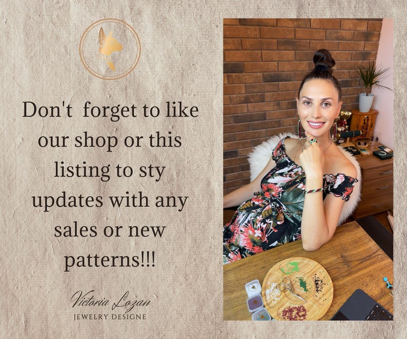 May include: A person wearing a black off-the-shoulder dress with a vibrant tropical floral print in shades of red, green, and white. The person is adorned with a ring and a bracelet, while a wooden tray with small piles of colorful beads sits nearby.