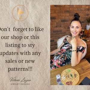 May include: A woman in a floral dress sits at a wooden table. The text reads, "Don't forget to like our shop or this listing to stay updated with any sales or new patterns!!!" The shop name "Victoria Lozan Jewelry Designe" is also visible.