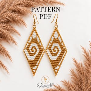 May include: A pair of diamond-shaped beaded earrings featuring a geometric spiral pattern in metallic gold and white. The earrings hang from gold-toned metal hooks. The text PATTERN PDF is visible above the earrings, and V Lozan JD is below.