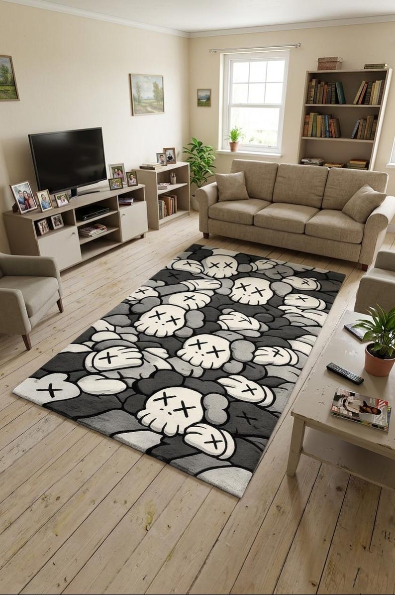 May include: A rectangular area rug featuring a repeating pattern of stylized white skull-like heads with crossed-out eyes and gloved hands, set against a dark gray and black background of overlapping organic shapes and shadows.