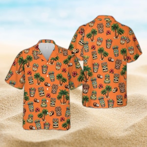 Peut inclure: Chemise orange à manches courtes avec un motif répété de masques tiki, de palmiers, de noix de coco et de fleurs. La chemise a une fermeture boutonnée et un col classique. Le design évoque les vacances tropicales.