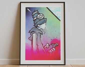 May include: A framed art print featuring a stylized illustration of a figure wearing a beanie with a smiley face emblem, holding a spray paint can. The background is a vibrant gradient of blue, green, and pink with a spray-painted texture effect.