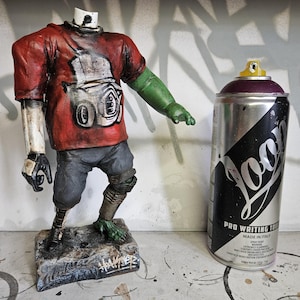 Graffitifigur Leksaksdel Staty Skulptur av Hoakser