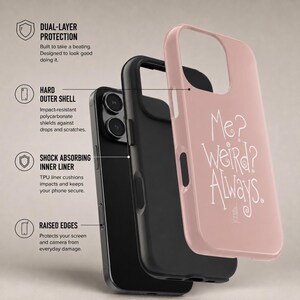 May include: A dual-layer phone case featuring a dusty pink outer shell with the white text Me? Weird? Always. and a black shock-absorbing inner liner. The design highlights impact-resistant polycarbonate, a TPU liner, and raised edges for protection.