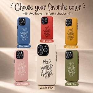May include: Six smartphone cases in blue, red, yellow, pink, cream, and olive green. Each case features a triple-lens camera cutout and the printed text "Me? Weird? Always." with a small house icon at the bottom. The cases are arranged in a grid.