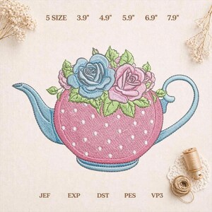 May include: An embroidery design of a pink teapot with white polka dots, a blue handle and spout, and a bouquet of blue and pink roses with green leaves. Text above reads 5 SIZE 3.9" 4.9" 5.9" 6.9" 7.9" and text below reads JEF EXP DST PES VP3.