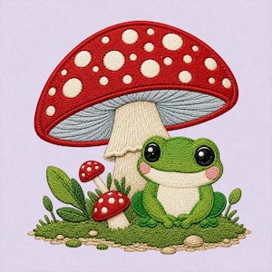 May include: An embroidered patch featuring a large red mushroom with white spots, a smaller red mushroom, and a green frog with large black eyes and pink cheeks. The design includes green leaves and a textured mossy base on a light purple background.