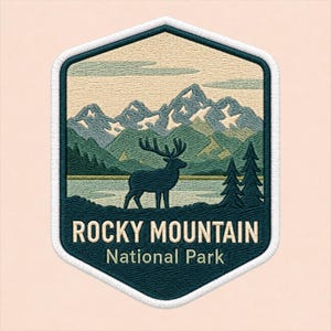 May include: A hexagonal embroidered patch featuring a landscape of Rocky Mountain National Park. The design shows a dark blue elk silhouette, green mountains, a lake, and two pine trees. The text reads ROCKY MOUNTAIN National Park in white.