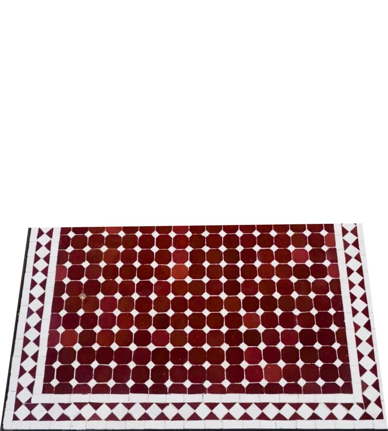 May include: A rectangular tile table top featuring a repeating pattern of dark red squares. The border is white with a diamond pattern, and a black edge. Suitable for indoor or outdoor use, this table top is a decorative piece.