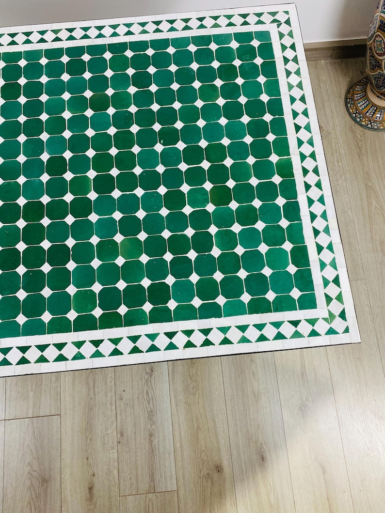 May include: A distressed wooden sign, inscribed with 'Welcome to our home' in white. The sign has a rustic appearance, ideal for a porch or hallway, and is designed with a simple, welcoming aesthetic.