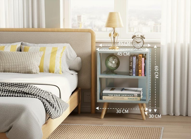 Light blue modern nightstand with hardwood legs in cozy bedroom