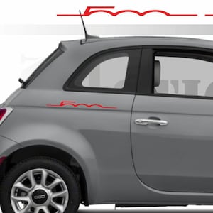 May include: A grey Fiat 500 car with red accent lines. The car has a two-door design and a black roof. The wheels are silver with black tyres. The Fiat logo is visible on the front and rear of the car.