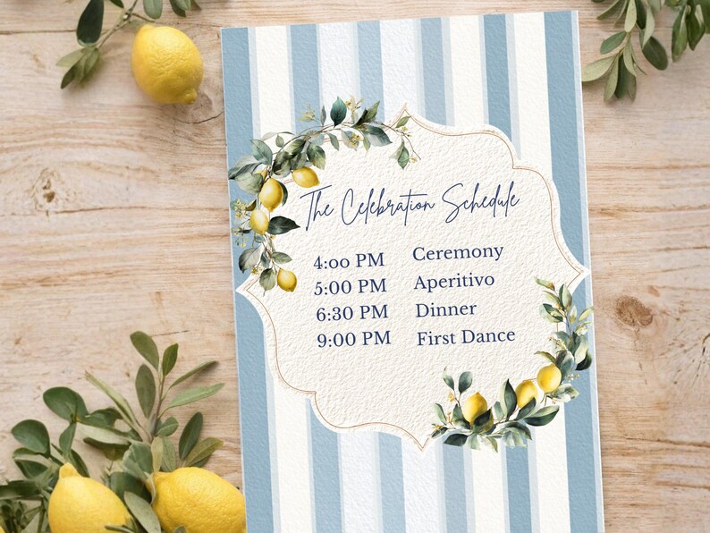 May include: A wedding schedule card with a light blue and white striped background. The card features the text "The Celebration Schedule" and a schedule of events. Lemon and leaf illustrations decorate the card.