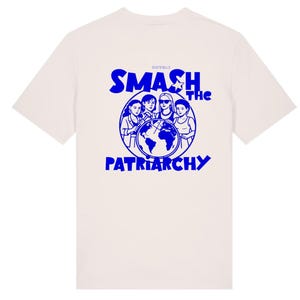 May include: Cream-colored t-shirt with a blue graphic on the back. The graphic features four women surrounding a globe, with the words "SMASH THE PATRIARCHY" in blue. The brand name "SOSTENELLE" is above the graphic.