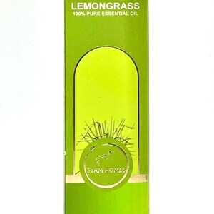 May include: A green box of lemongrass essential oil. The box has the text "LEMONGRASS 100% PURE ESSENTIAL OIL" and "30 ml". A circular logo with the text "SYAM HOMES" is also visible.