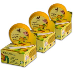 Könnte beinhalten: Drei Schachteln Mango Herbal Zahnpasta werden gezeigt, jede mit einem gelben Deckel und einer gelben Schachtel. Der Deckel zeigt Text und ein Vogellogo. Die Schachtel zeigt Mango-Illustrationen und Text in einer Fremdsprache. Das Produkt ist für die Mundhygiene.