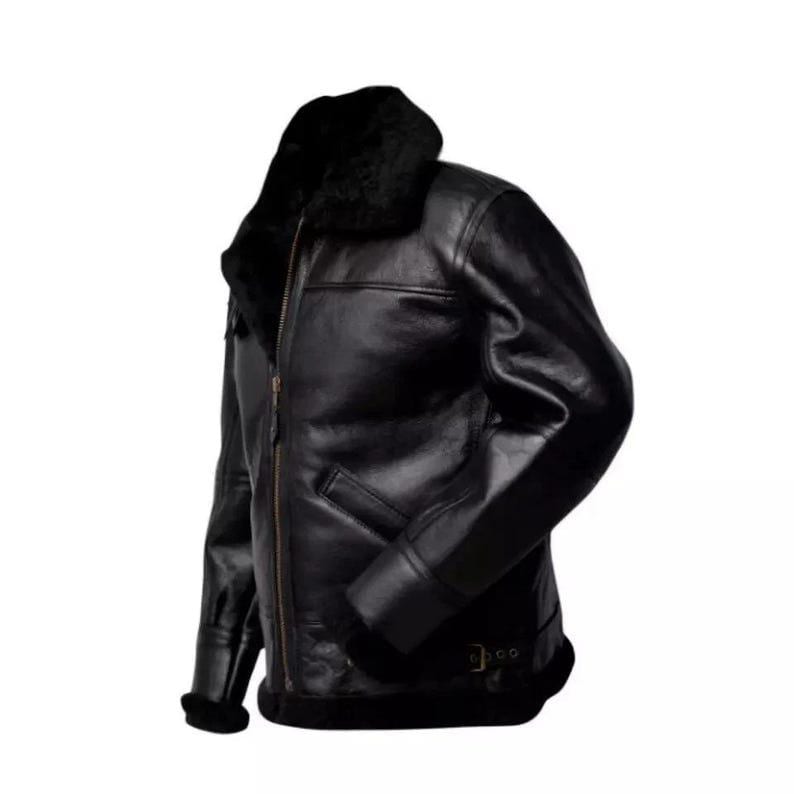 May include: A black leather jacket with a shearling collar and lining. The jacket features a front zipper closure, a small pocket, and a buckled belt detail at the waist. The sleeves have a fur trim at the cuffs.