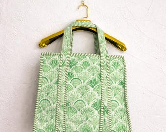 Bolsa de algodón acolchada con estampado floral verde de AGEXPORT
