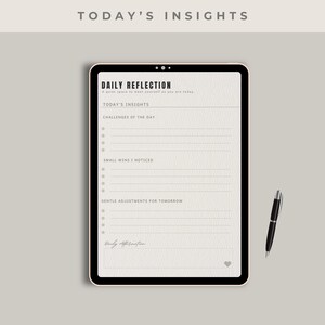 May include: A digital planner with the text "Today's Insights" and "Daily Reflection." The planner includes sections for daily insights, challenges, small wins, and adjustments. A black pen rests beside the planner on a neutral background.