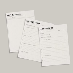 May include: Three off-white Daily Reflection journal pages. The pages have lines for writing and prompts such as "Today's Insights", "Challenges of the Day", and "How Did I Feel Today?" The top of each page reads "Daily Reflection: A quiet space to meet yourself as you are today."