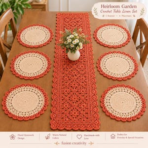 May include: A crochet table linen set titled Heirloom Garden, consisting of one rectangular runner and six round placemats. The items feature a burnt orange border with a cream-colored center, showcasing intricate floral openwork and scalloped edges.