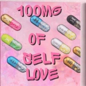 May include: A square canvas print with a pink marbled background featuring the text 100MG OF SELF LOVE in bold pink letters. Scattered across the surface are various colourful capsule-shaped pills filled with glitter and branded with logos.