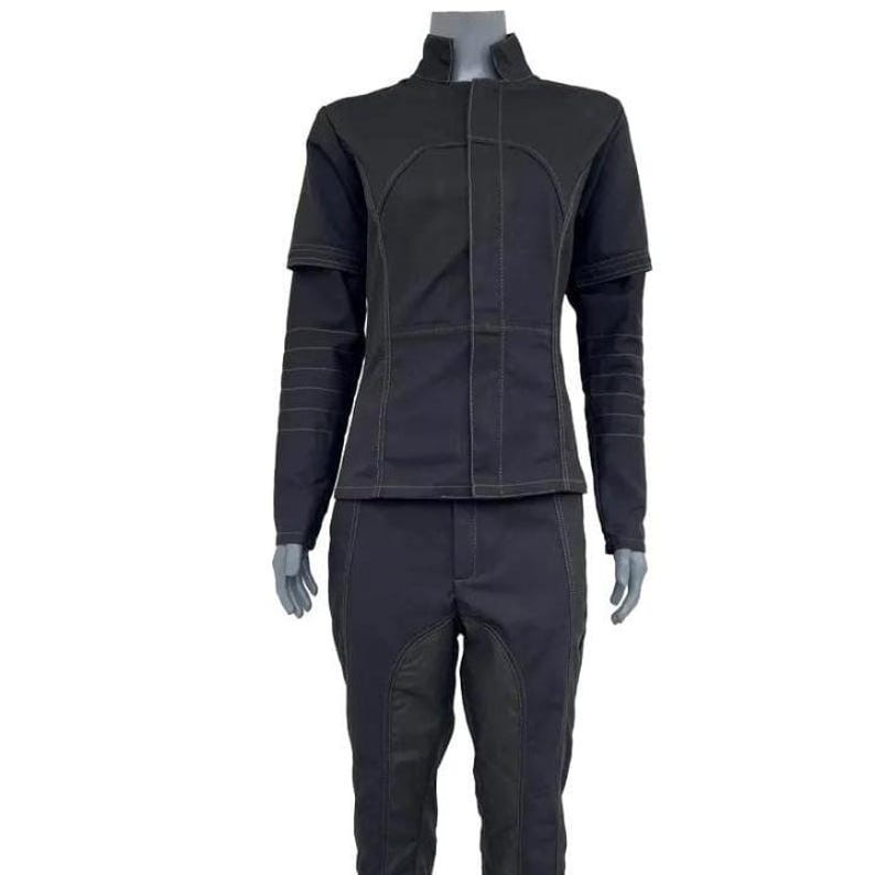 May include: A black two-piece outfit comprising a jacket and trousers. The jacket has a high collar, short sleeves, and contrasting stitching. The trousers feature a distinctive panel design. The outfit is displayed on a mannequin.