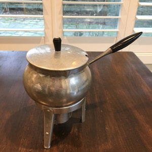 Silver look fondue pot with mid century design aluminum