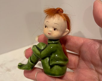 Vintage green  pixie figurine with red hair Japan