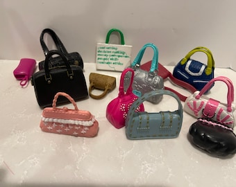 Group of Barbie or ken or bratz like toys doll accessories miscellaneous Bags purses