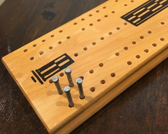 Natural finish cribbage board with pegs