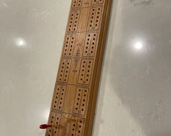 Vintage Lowe Natural finish cribbage board with pegs complete