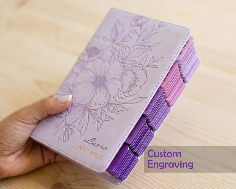 Engraved purple leather KJV Bible personalized for women featuring a custom name engraved on the cover, elegant pink indexing tabs, classic King James Version text, and a timeless Christian design, perfect as a faith-filled gift for her, baptism, or special occasion