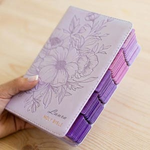 Purple leather King James Version Bible personalized with engraved name for women, featuring pink page tabs, durable binding, and elegant Christian styling, perfect for gifting on birthdays, confirmations, baptisms, holidays, or spiritual milestones