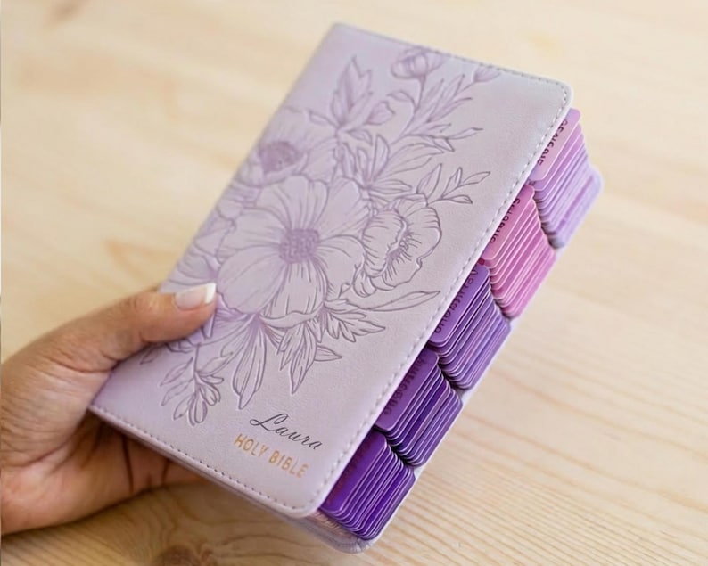 Purple leather King James Version Bible personalized with engraved name for women, featuring pink page tabs, durable binding, and elegant Christian styling, perfect for gifting on birthdays, confirmations, baptisms, holidays, or spiritual milestones