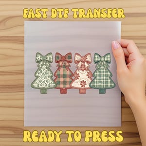 May include: A sheet featuring four Christmas tree designs with bows. The trees have different patterns: floral, plaid, and a mix of both. The text "FAST DTF TRANSFER" and "READY TO PRESS" are displayed in a yellow font.
