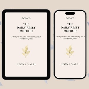 May include: A digital tablet and smartphone display the cover of "The Daily Reset Method" book. The cover features the title, author Leona Valli, and a simple leaf illustration on a cream background. The book's subtitle is "A Simple Routine for Clearing Your Mind Every Day."