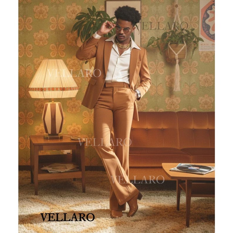 May include: A brown suit with a matching jacket and flared trousers. The suit is worn with a white collared shirt and gold chain. The image is set in a retro-style room with patterned wallpaper and a brown sofa. The word "VELLARO" is visible in the image.