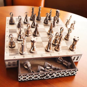 DIY laser cut wooden chess and checkers set with integrated storage drawers, shown assembled from a digital SVG file