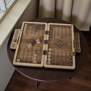 Laser cut wooden backgammon board game SVG file design, featuring a portable folding travel case and intricate geometric engraving patterns for CNC or Glowforge