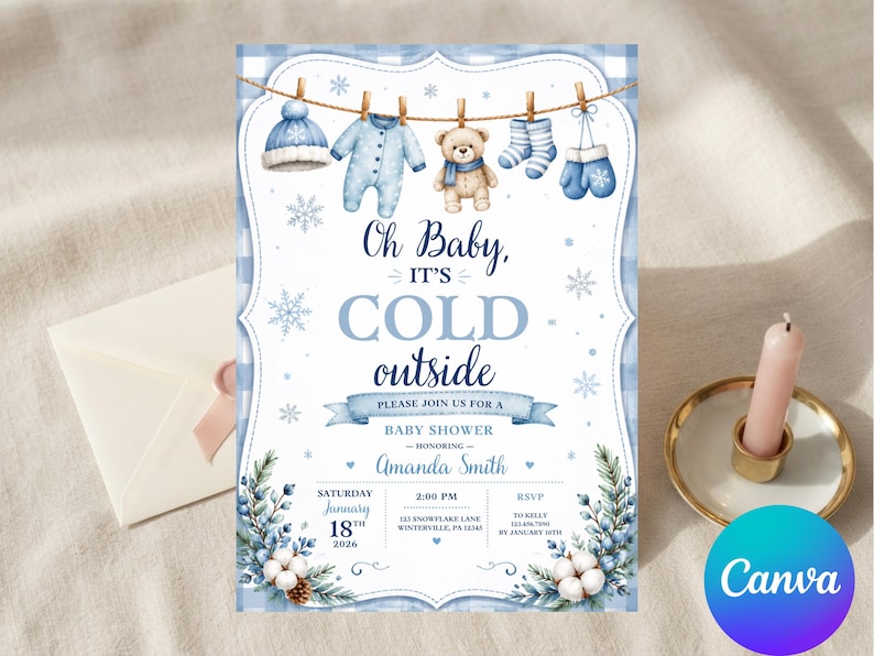 May include: A baby shower invitation card featuring a blue plaid border, a clothesline with a hat, onesie, teddy bear, socks, and mittens, and the text Oh Baby, IT'S COLD outside. The card includes event details for Amanda Smith on January 18, 2026.