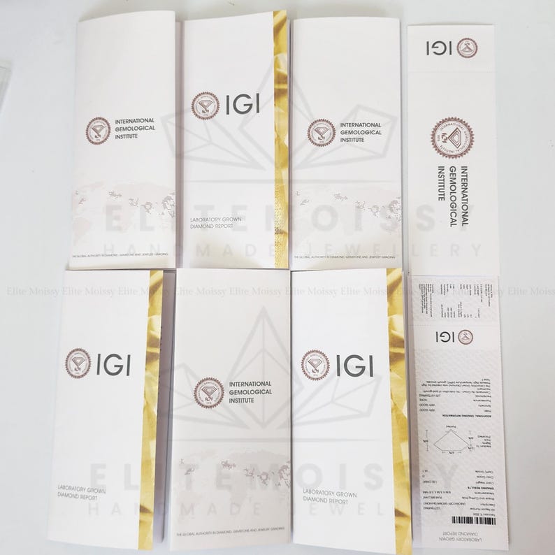 May include: A collection of white IGI Laboratory Grown Diamond Report documents. The documents feature the IGI logo, text, and a gold-colored vertical stripe. The documents are for handmade jewelry.