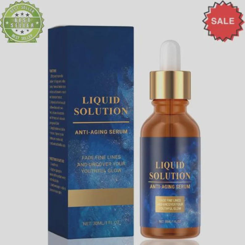 May include: An amber-colored bottle and a navy blue box of Liquid Solution anti-aging serum. The bottle has a gold cap and a dropper. The box and bottle feature the text "Liquid Solution" and "Anti-Aging Serum". The product is 1 fl oz.