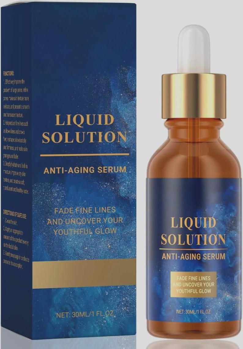 May include: An anti-aging serum in a brown glass bottle with a gold cap and dropper. The label reads "Liquid Solution, Anti-Aging Serum." A matching box displays the same text and "Fade Fine Lines and Uncover Your Youthful Glow." The bottle contains 1 fl oz.