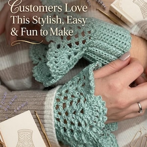 May include: Close-up of a light green crochet sleeve cuff with a scalloped edge. The text "Customers Love This Stylish, Easy & Fun to Make" is visible. A crochet hook and a small book are also in the image.