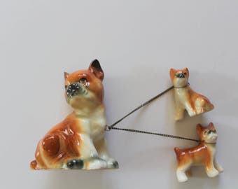 Vintage Ceramic Boxer Dog Chained to Puppies Figurine Statue 1950s