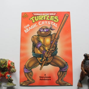 Vintage Teenage Mutant Ninja Turtles 'The Magic Crystal' Libro de cuentos con dos figuras de acción 1990