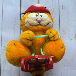 Vintage Garfield Stuffed Animal Riding a Sled 1981