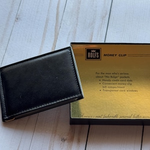 Monedero vintage Rolfs de piel de vaca negra con clip para billetes, década de 1970